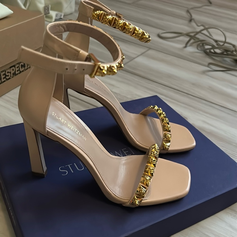 Stuart Weitzman blush colored heels.